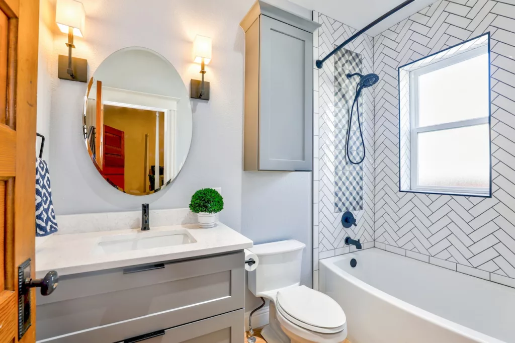 A Full Bathroom with a Tile Tub Surround